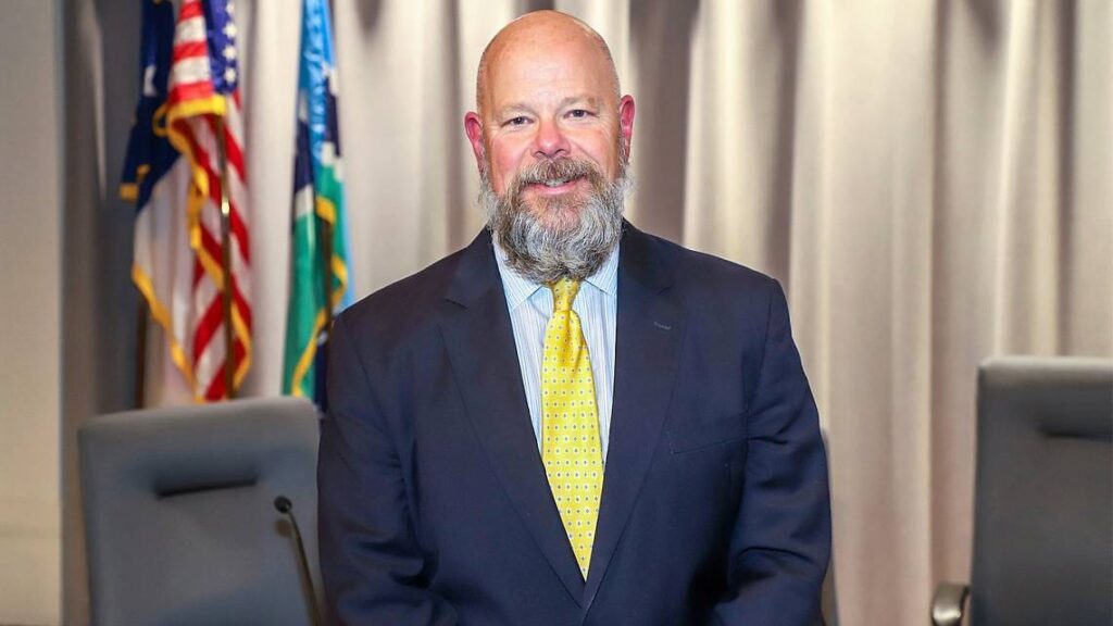 Chris-Blue head shot